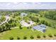 Aerial view of community park featuring playground, parking, pond, and walking paths at 991 Terra Ln, Franklin, IN 46131