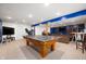 Large finished basement featuring a ping pong table and ample recreational space at 9910 Suncoral Cir, Fishers, IN 46038