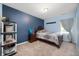 Charming bedroom with a cozy bed, soft lighting, and a peaceful ambiance at 9910 Suncoral Cir, Fishers, IN 46038