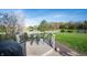 Charming deck overlooking a serene pond, perfect for relaxing outdoors at 9910 Suncoral Cir, Fishers, IN 46038