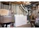Functional laundry area with utility sink and washer and dryer at 9910 Suncoral Cir, Fishers, IN 46038