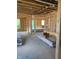 Unfinished interior showing the wood frame and layout of the main living space at 1041 Fuller Ln, Shelbyville, IN 46176