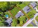 Expansive property with a well-maintained lawn, mature trees, and a charming pool area at 10444 Collingswood Ln, Fishers, IN 46037