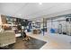 Spacious basement area with ample storage, exercise equipment, and utilities at 10444 Collingswood Ln, Fishers, IN 46037