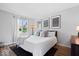 Bright bedroom with a window and natural light and clean design at 10444 Collingswood Ln, Fishers, IN 46037