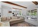 Inviting living room that opens up to the screened-in porch and kitchen at 10444 Collingswood Ln, Fishers, IN 46037