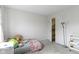Bedroom featuring a plush bed and natural light at 10616 Bartley Dr, Indianapolis, IN 46236