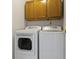 A laundry room featuring a white dryer and washing machine at 10616 Bartley Dr, Indianapolis, IN 46236