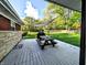 A nice outdoor view from the deck with a picnic table, backyard, and covered area with sunshade at 10751 N Kitchen Rd, Mooresville, IN 46158