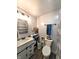 Well-lit bathroom showcasing a modern vanity, updated fixtures, and stylish decor at 10751 N Kitchen Rd, Mooresville, IN 46158