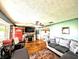 Comfortable living room featuring hardwood floors and large sectional at 10751 N Kitchen Rd, Mooresville, IN 46158