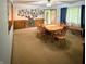 Traditional dining room featuring wooden furniture, neutral walls, and carpet at 10946 Maze Rd, Indianapolis, IN 46259