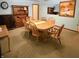 Traditional dining room featuring wooden furniture, neutral walls, and built-in hutch at 10946 Maze Rd, Indianapolis, IN 46259