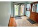 Convenient mud room featuring a wooden bench and access to a patio at 10946 Maze Rd, Indianapolis, IN 46259