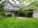 Charming two-story home featuring a well-manicured lawn and inviting front entrance at 11021 Brentwood Ave, Zionsville, IN 46077