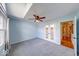 A bedroom featuring french doors, a ceiling fan and neutral carpet at 1120 Crystal Ct, Avon, IN 46123