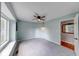 A cozy bedroom with soft carpet, a ceiling fan, and an inviting atmosphere at 1120 Crystal Ct, Avon, IN 46123