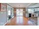 Dining room showcases hardwood floors and sliding glass doors to the backyard at 1120 Crystal Ct, Avon, IN 46123