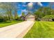 Lovely home featuring a two-car garage, brick accents, and a well-kept lawn with mature trees at 1120 Crystal Ct, Avon, IN 46123