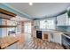 Kitchen showcases butcher block countertops, brick floors, and backyard access at 1120 Crystal Ct, Avon, IN 46123