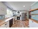 Charming kitchen boasts butcher block counters and stainless steel appliances at 1120 Crystal Ct, Avon, IN 46123