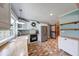 Bright kitchen featuring stainless steel appliances, butcher block counters, and brick floors at 1120 Crystal Ct, Avon, IN 46123