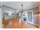 Spacious living room features hardwood floors, a fireplace, and a cozy sunroom entrance at 1120 Crystal Ct, Avon, IN 46123