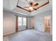 Main bedroom with carpet, windows, and walk-in closet at 1120 Crystal Ct, Avon, IN 46123
