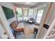 Cozy sunroom with wicker furniture and plenty of natural light at 1120 Crystal Ct, Avon, IN 46123