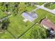 Aerial view of the property featuring the house and spacious fenced backyard at 11603 Peacock Dr, Indianapolis, IN 46236