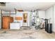 Basement featuring a washer, dryer, water heater and utility systems at 11603 Peacock Dr, Indianapolis, IN 46236