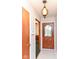 Inviting entryway with decorative front door and stylish light fixture at 11603 Peacock Dr, Indianapolis, IN 46236