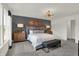 Main bedroom showcases two side tables, lamps, and decor above the headboard at 11820 Vale St, Indianapolis, IN 46235