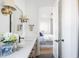 Bright bathroom with a modern vanity and a view into the bedroom at 11904 Spring Mill Rd, Carmel, IN 46032