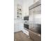 Gourmet kitchen features stainless steel appliances, white cabinets, and sleek countertops at 11904 Spring Mill Rd, Carmel, IN 46032