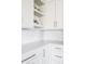 Modern kitchen with open shelving and white subway tile backsplash at 11904 Spring Mill Rd, Carmel, IN 46032