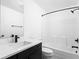 Modern bathroom features a black faucet and sleek black and white color palette at 1215 Herbert St, Indianapolis, IN 46202