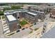 Elevated view of condos featuring a landscaped courtyard with a fountain, benches, and well-maintained green spaces at 127 Monon Green Blvd, Carmel, IN 46032