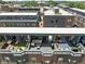 Aerial view of rooftop decks showcasing outdoor living spaces, including seating and dining areas at 127 Monon Green Blvd, Carmel, IN 46032