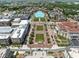 Expansive aerial view of a planned community featuring manicured green spaces, parking, and a variety of residential buildings at 127 Monon Green Blvd, Carmel, IN 46032