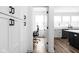 Hallway view shows kitchen and office space at 127 Monon Green Blvd, Carmel, IN 46032