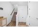 Open hallway featuring wood floors, neutral decor, a staircase and natural light at 127 Monon Green Blvd, Carmel, IN 46032