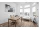 Bright and airy office space with large windows, wood floors, and stylish decor at 127 Monon Green Blvd, Carmel, IN 46032