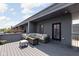 Relaxing roof deck with comfortable seating, a coffee table, and stylish decor, ideal for outdoor living at 127 Monon Green Blvd, Carmel, IN 46032