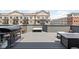 Inviting roof deck with a grill, an outdoor bench and city views, perfect for entertaining at 127 Monon Green Blvd, Carmel, IN 46032
