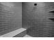 Modern shower featuring gray subway tiles, built-in bench, and rain shower head at 127 Monon Green Blvd, Carmel, IN 46032