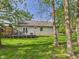 Backyard with a deck and a view of the house, offers a great space for outdoor gatherings and relaxation at 1356 S Catamaran Cir, Cicero, IN 46034