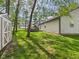 A large backyard with a utility shed and a deck, offering ample space for outdoor activities and storage at 1356 S Catamaran Cir, Cicero, IN 46034