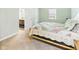 Cozy bedroom with neutral carpet and a rustic wooden bed frame, offering a peaceful retreat at 1356 S Catamaran Cir, Cicero, IN 46034