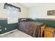 Classic bedroom design featuring a cozy bed, neutral carpet, and traditional decor elements for a relaxing space at 1356 S Catamaran Cir, Cicero, IN 46034
